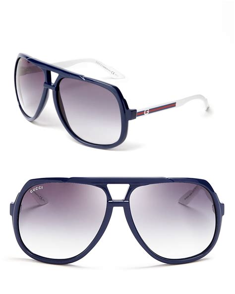 oversized blue aviator sunglasses.